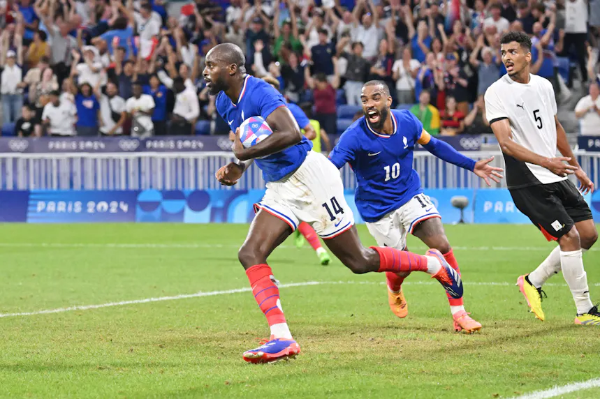 Jean-Philippe Mateta celebrates a goal during the Olympic Games as we profile the France vs. Spain men's Olympic soccer final, offering our best bets.
