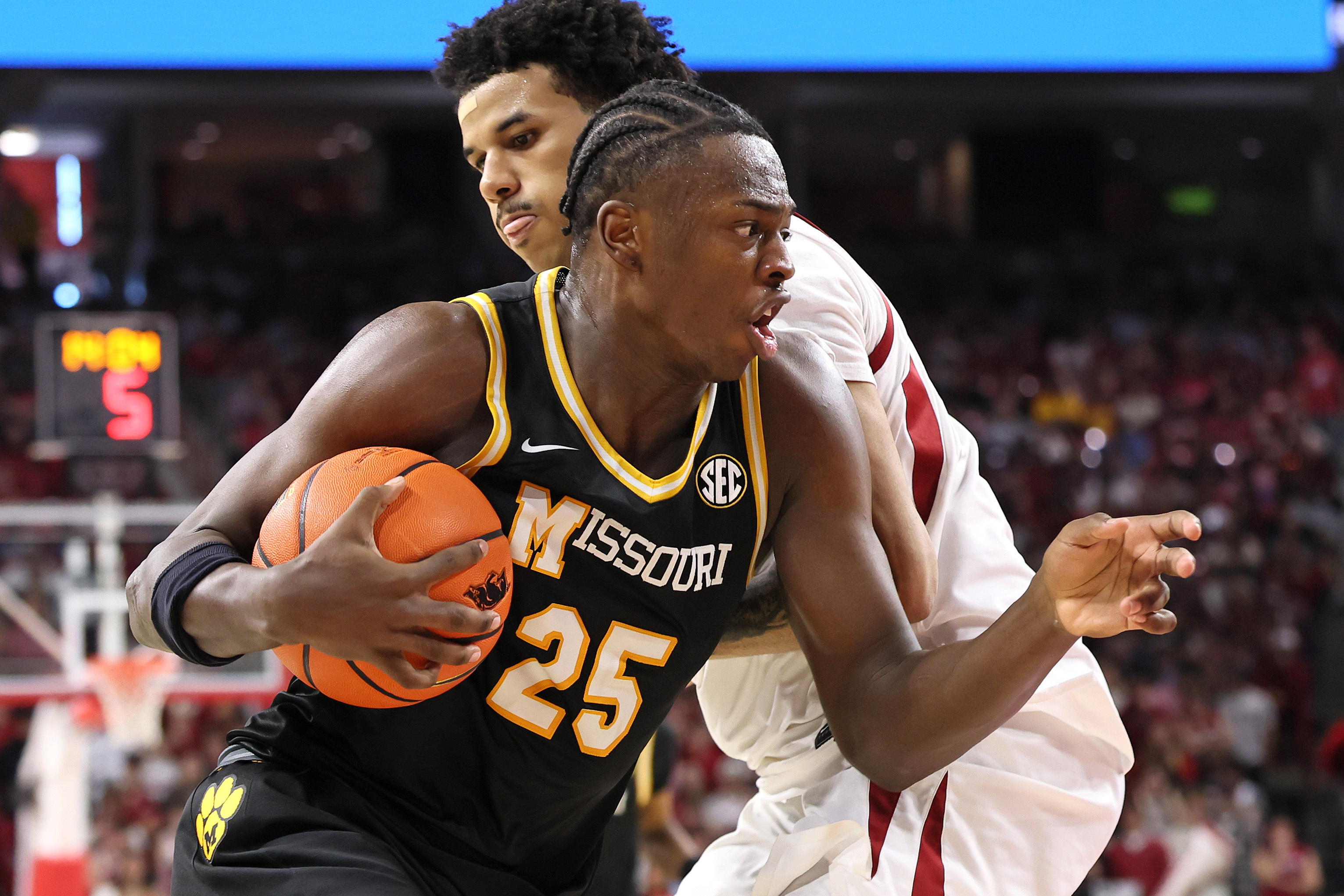 Missouri Tigers guard Mark Mitchell (25) drives as he is featured in our Missouri vs. Miami prediction & parlay.