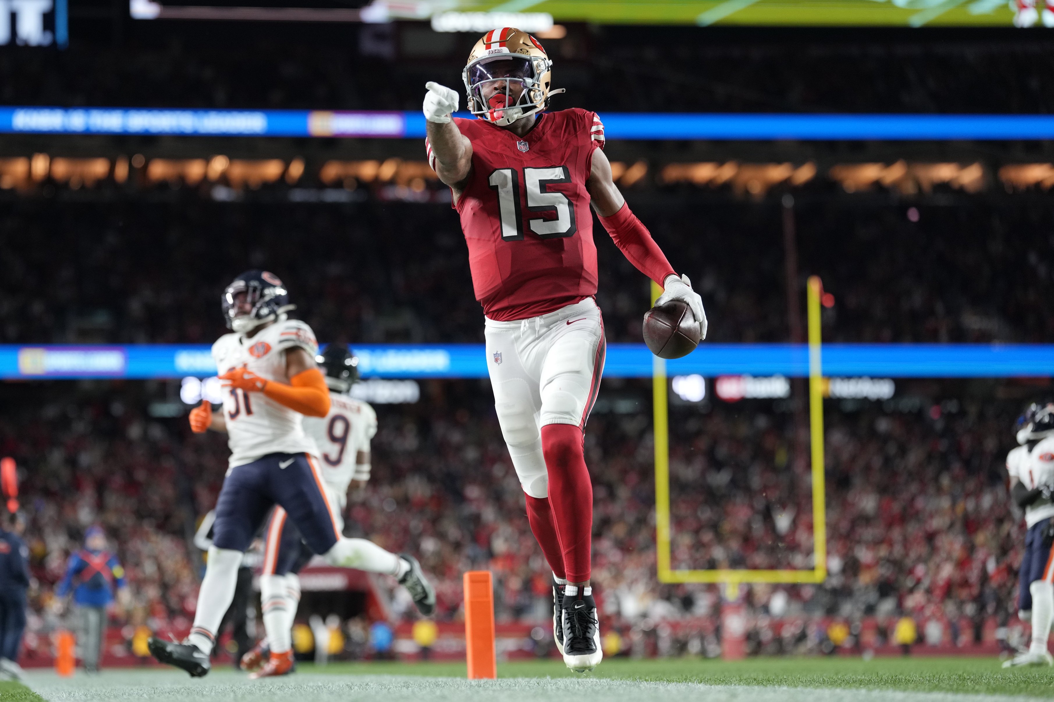 San Francisco 49ers wide receiver Jauan Jennings runs to score a touchdown as we look at the Week 18 NFL odds