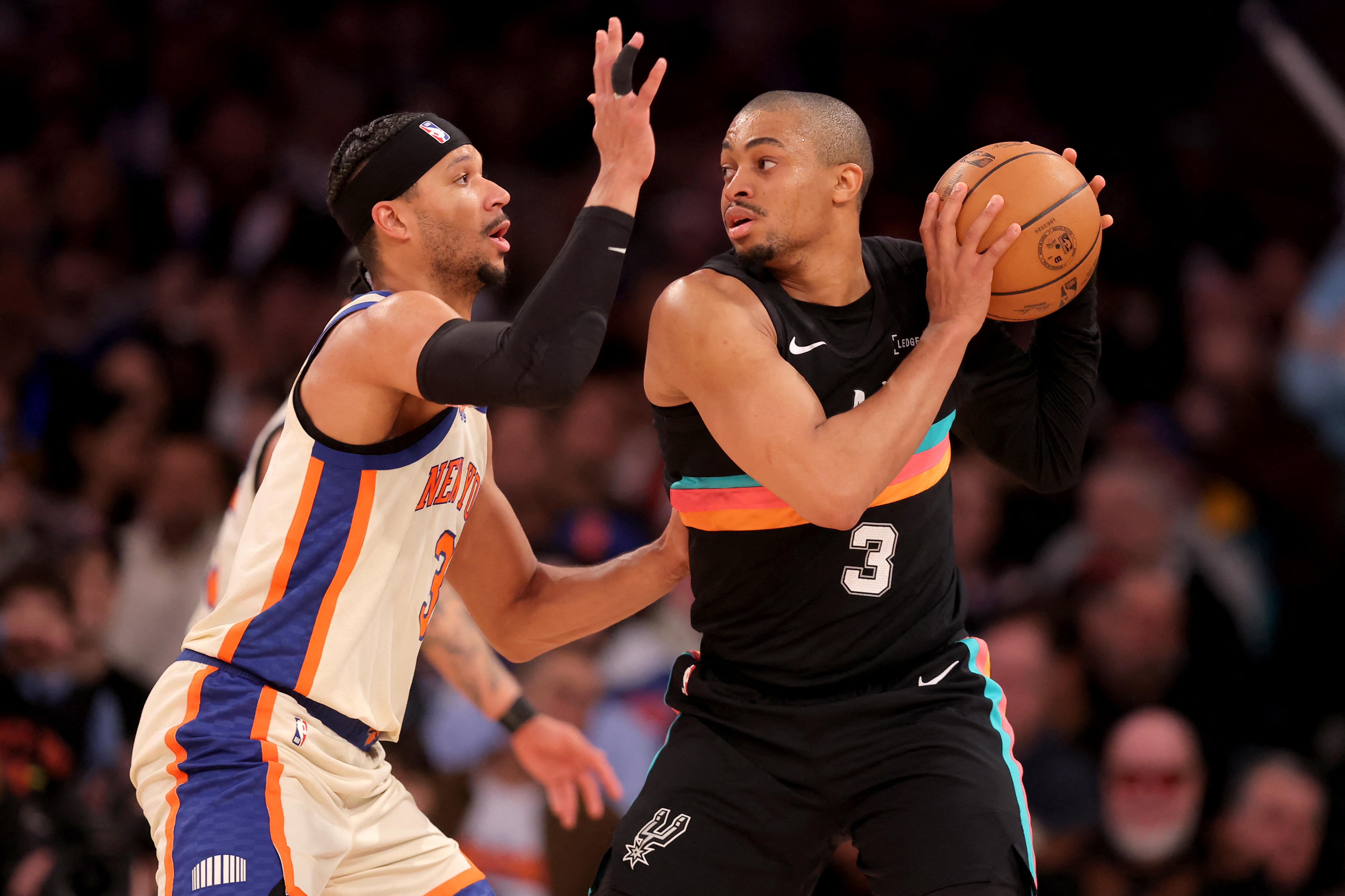 San Antonio Spurs forward Keldon Johnson (3) controls the ball as we break down our Rockets vs. Spurs player props today.