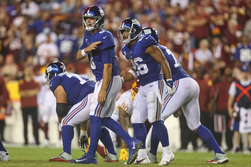 Daniel Jones of the New York Giants signals from the line of scrimmage during the third quarter against the Washington Football Team at FedExField on September 16, 2021 in Landover, Maryland.