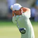Rory McIlroy of Northern Ireland plays his tee shot on the 12th hole as we make our best Players Championship picks and predictions