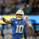 Justin Herbert of the Los Angeles Chargers passes against the Miami Dolphins at SoFi Stadium, and we look at the best Justin Herbert player props for Sunday Night Football.