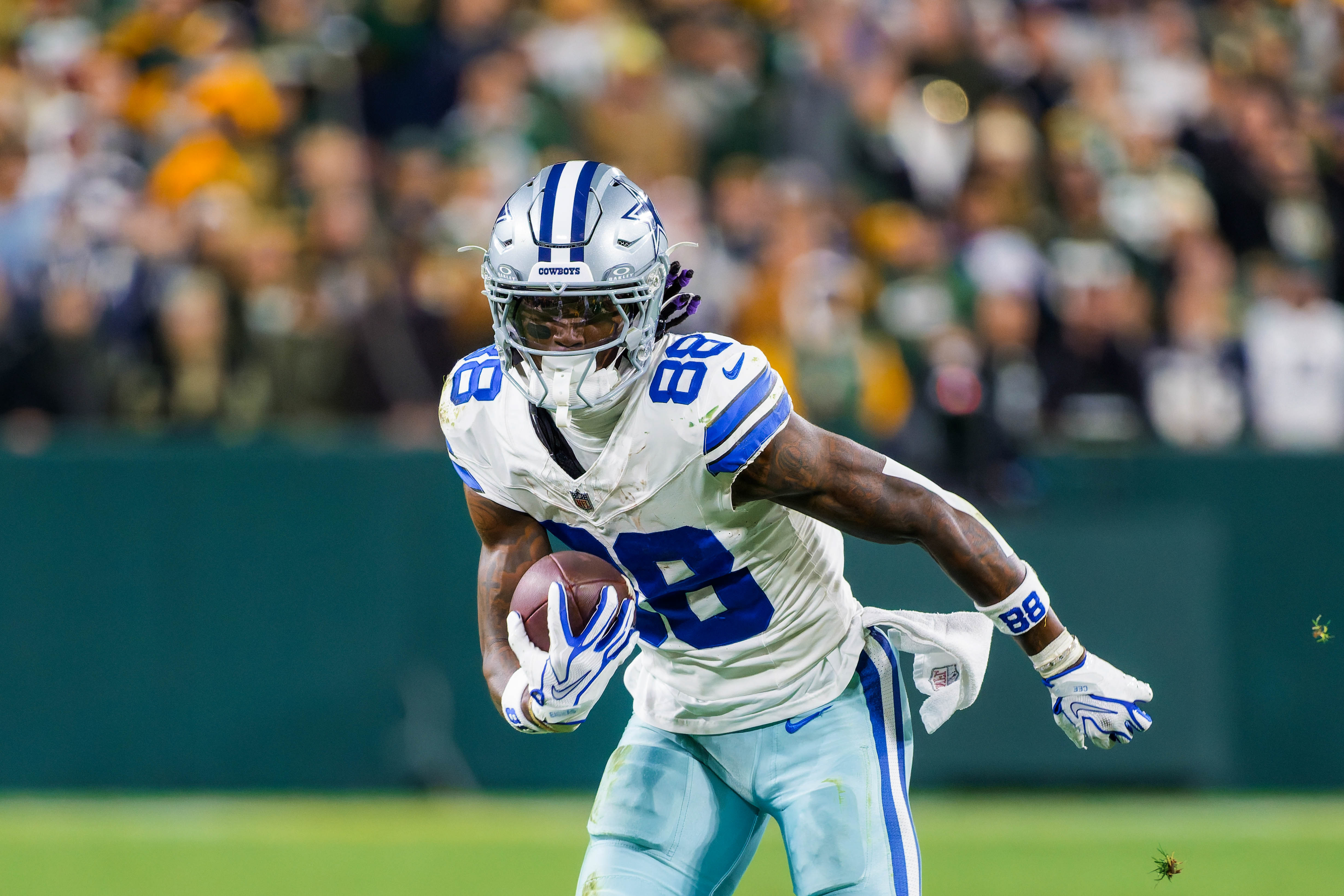 Dallas Cowboys CeeDee Lamb (88) carries the football as he is featured in our Cowboys vs. Eagles touchdown scorer pick.