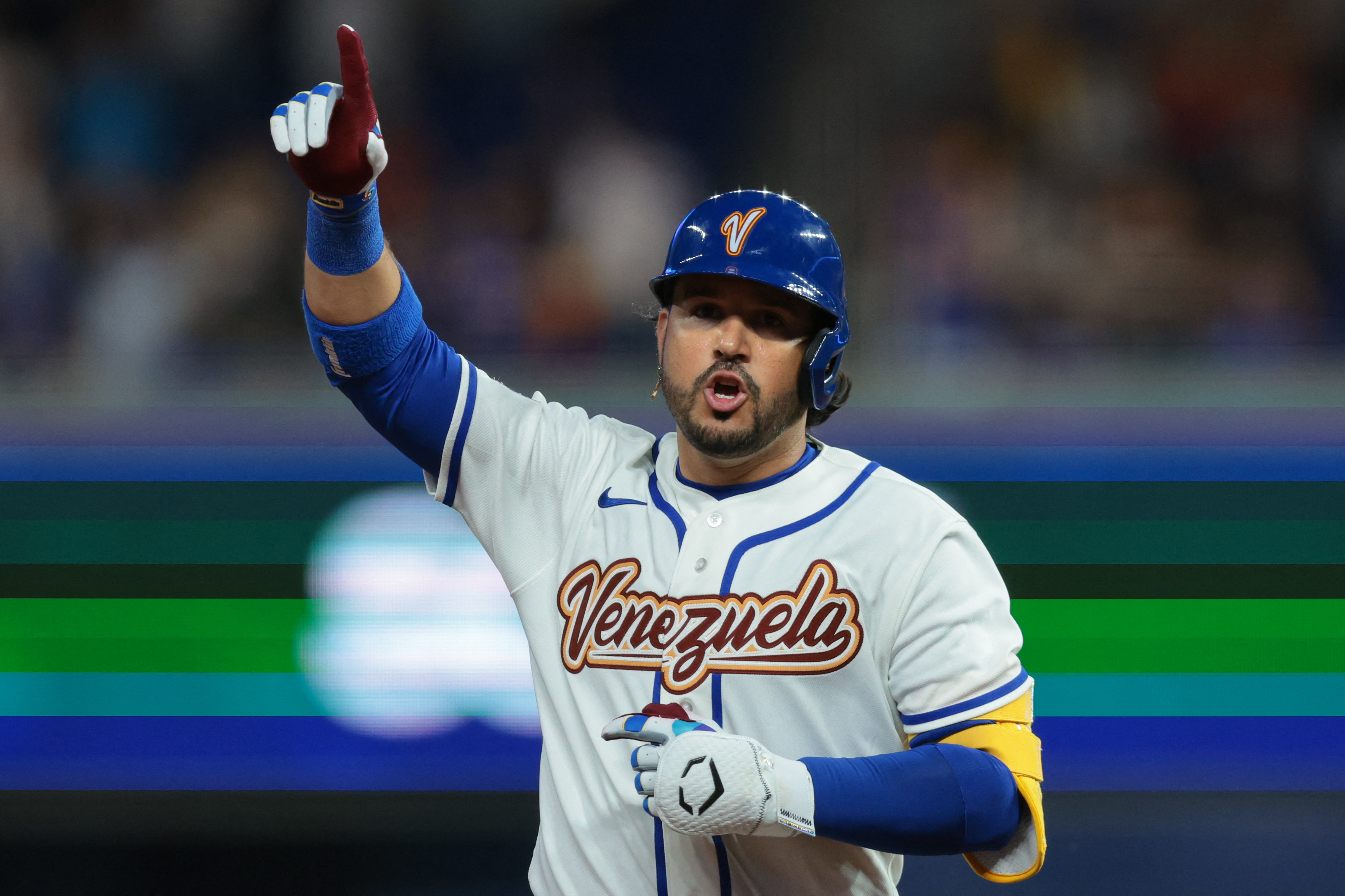 Venezuela designated hitter Eugenio Suarez - who's featured in my home run predictions for the WBC finals - rounds the bases after hitting a two-run home run. 