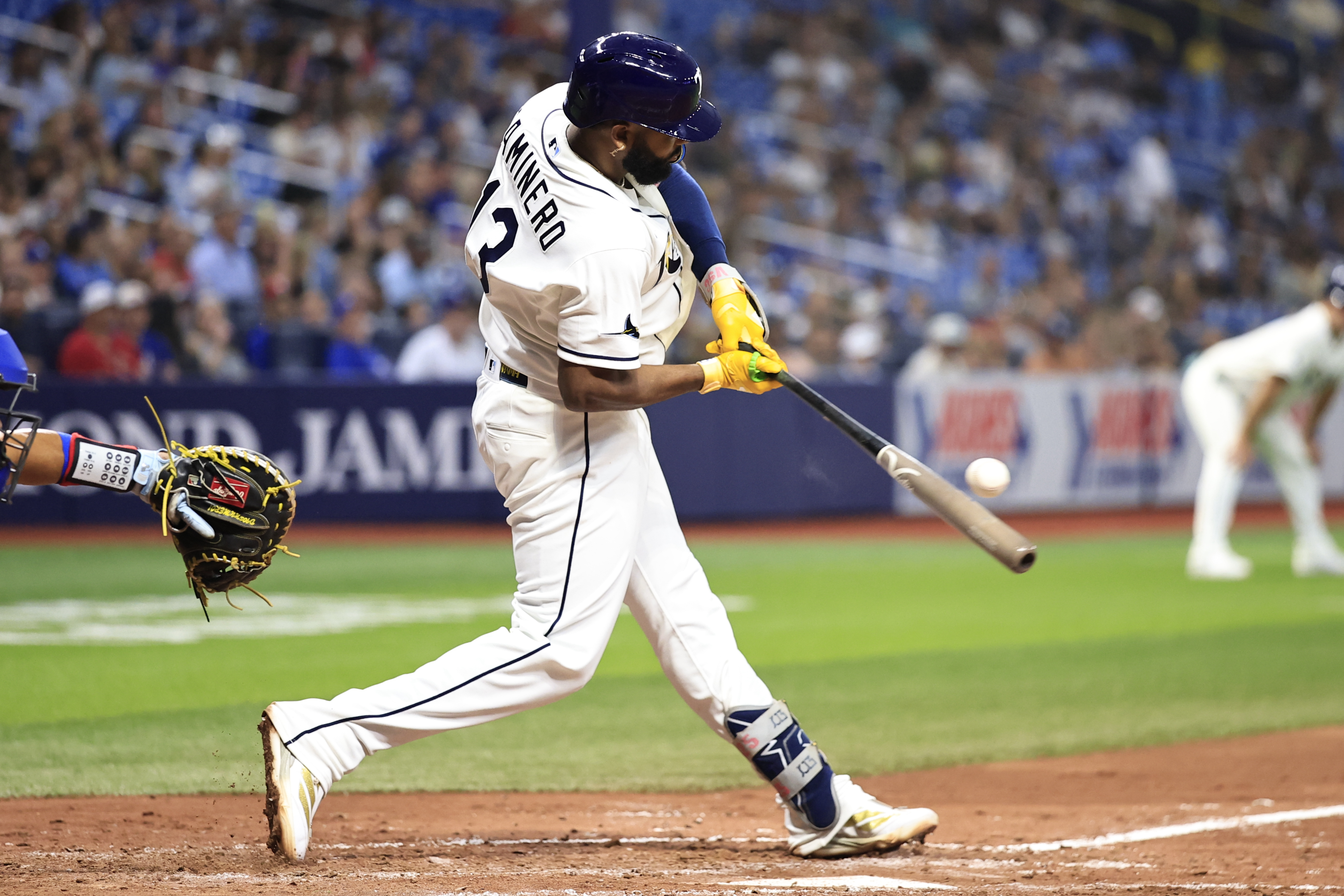 Tampa Bay Rays third baseman Junior Caminero (13) swings as he is featured in our MLB best home run predictions today.