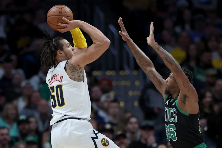 Aaron Gordon #50 of the Denver Nuggets puts up a shot against Marcus Smart #36 of the Boston Celtics during the first quarter at Ball Arena on January 01, 2023 in Denver, Colorado.