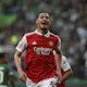 Arsenal defender William Saliba celebrates after scoring his team's first goal during the UEFA Europa League and we offer our best odds and picks for Fulham vs. Arsenal.