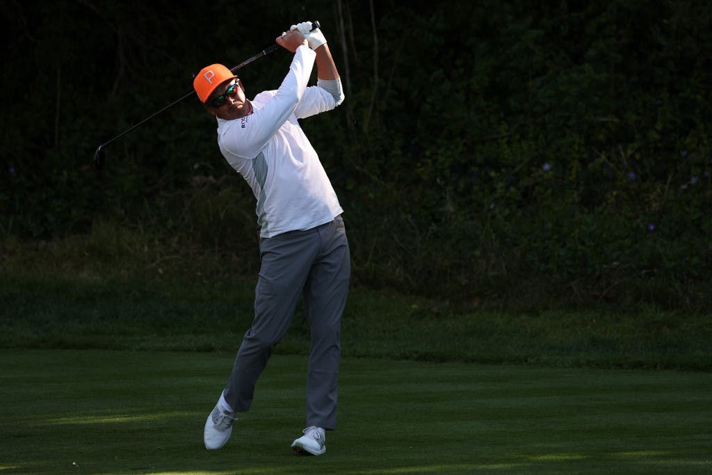 Rickie Fowler is among our Arnold Palmer Invitational expert picks as he plays a shot from the fairway.