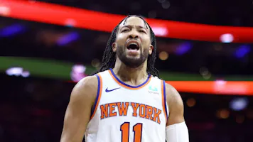 Jalen Brunson #11 of the New York Knicks reacts as we offer our best 76ers vs. Knicks player props and predictions for Game 1 of the NBA playoffs.