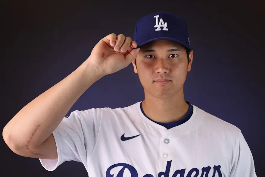 Shohei Ohtani of the Los Angeles Dodgers poses during photo day, and we offer a look at the best MLB odds for Shohei Ohtani bets in 2024.