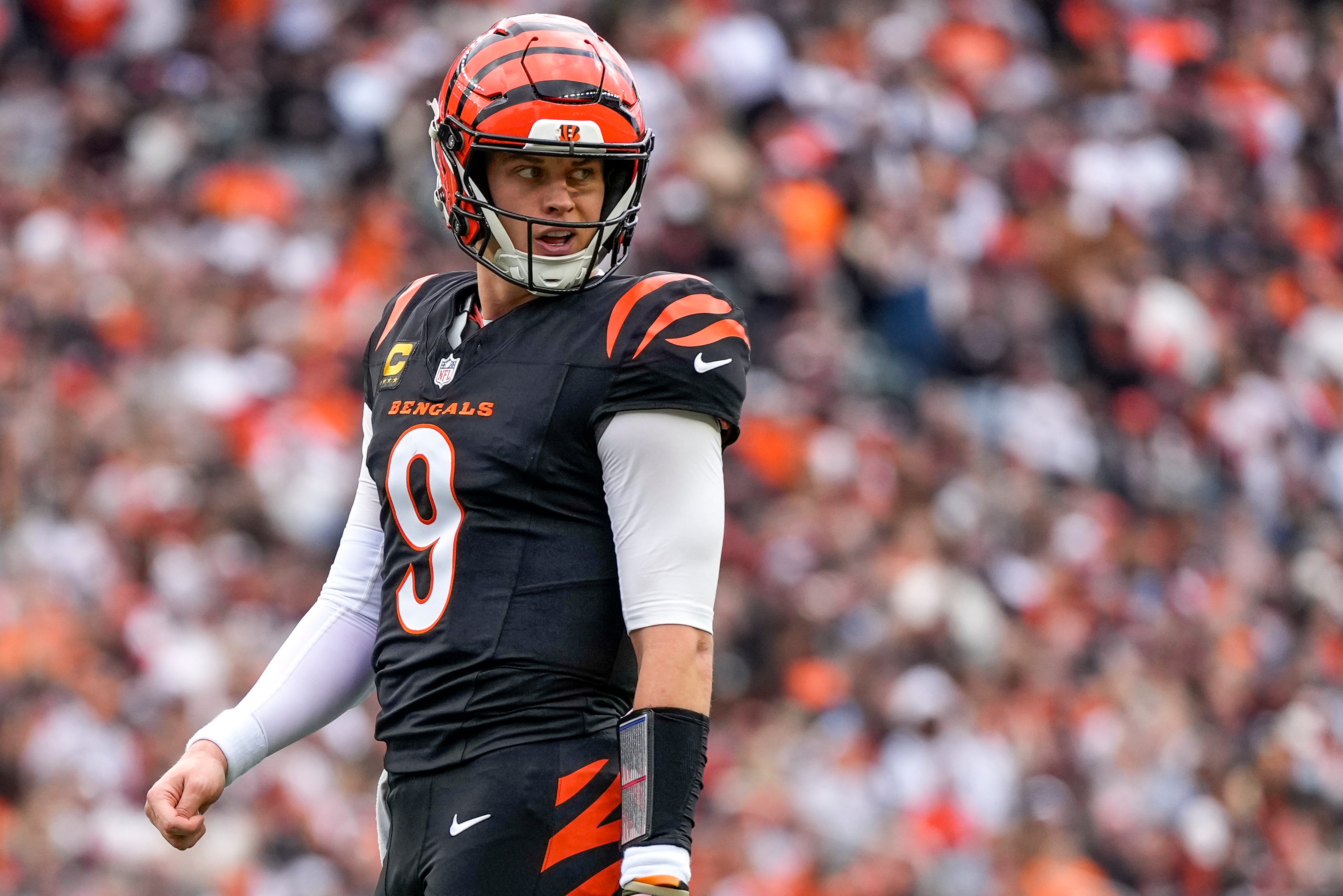 Cincinnati Bengals quarterback Joe Burrow (9) looks back to the sideline as we provide our Buccaneers vs. Bengals prediction.