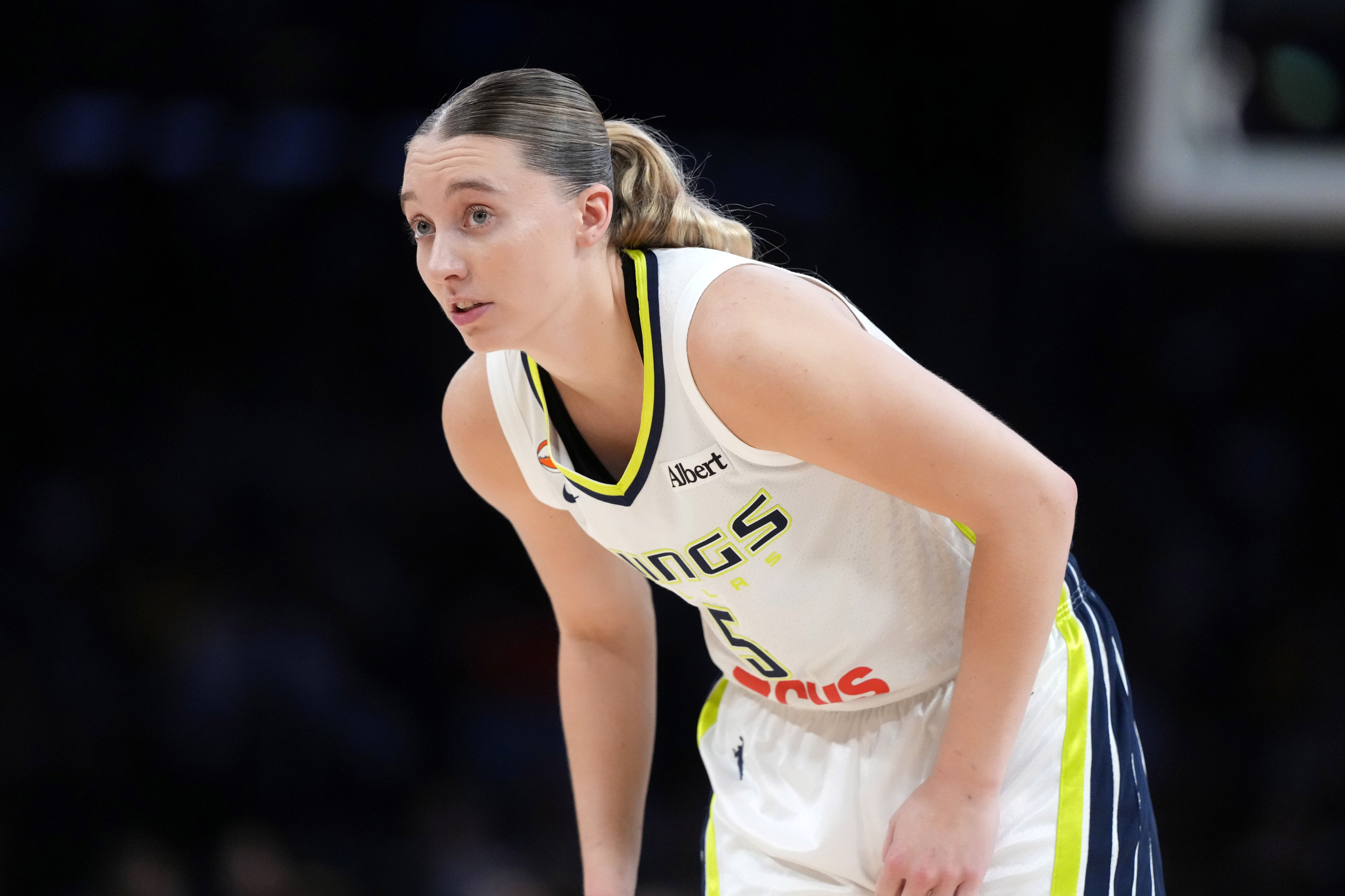 Dallas Wings guard Paige Bueckers (5), seen here reacting during a game, is featured in our Aces vs. Wings prediction.