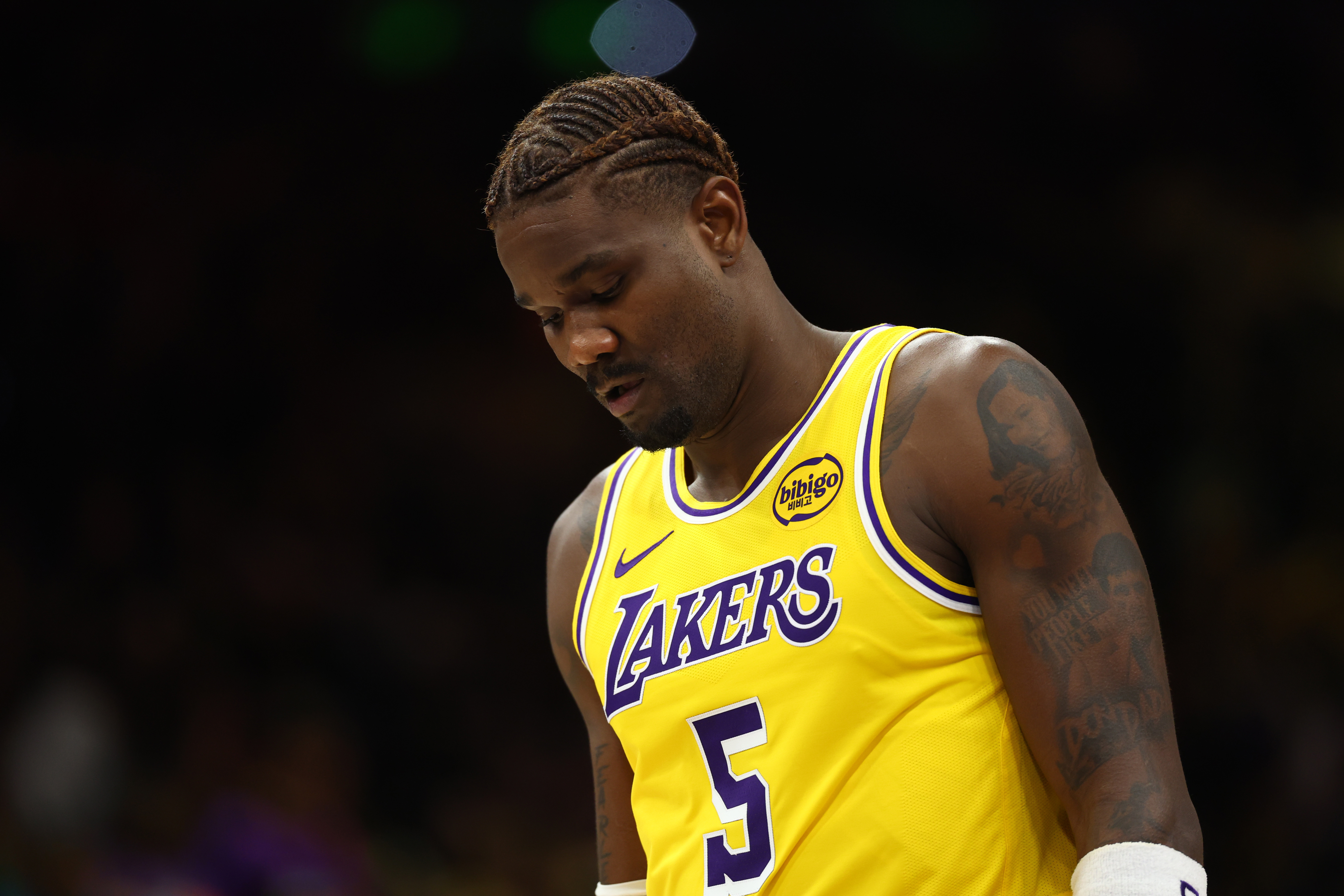Los Angeles Lakers center Deandre Ayton (5), seen here reacting, is featured in our NBA player props and best bets tonight.