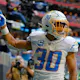 Austin Ekeler of the Los Angeles Chargers celebrates a touchdown during the first half in the game against the Atlanta Falcons at Mercedes-Benz Stadium on Nov. 6.