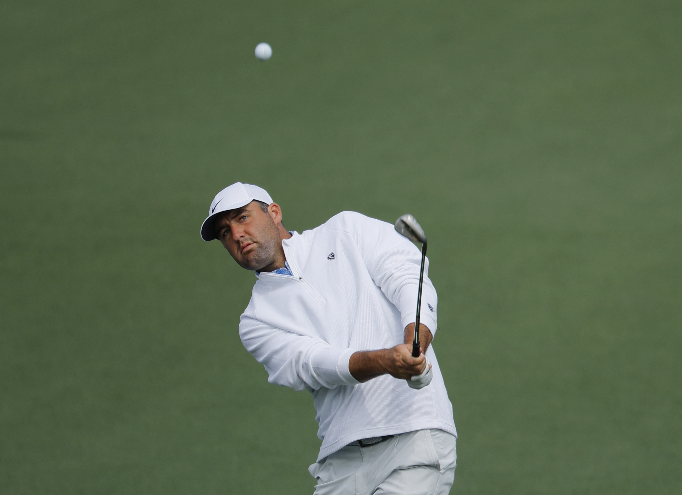 Scottie Scheffler - who's featured in my Masters prop bets for 2026 - of the U.S. chips onto the green.