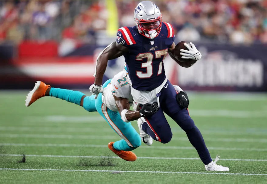Damien Harris of the New England Patriots runs with the ball against the Miami Dolphins at Gillette Stadium on Sept. 12, 2021 in Foxborough, Massachusetts.