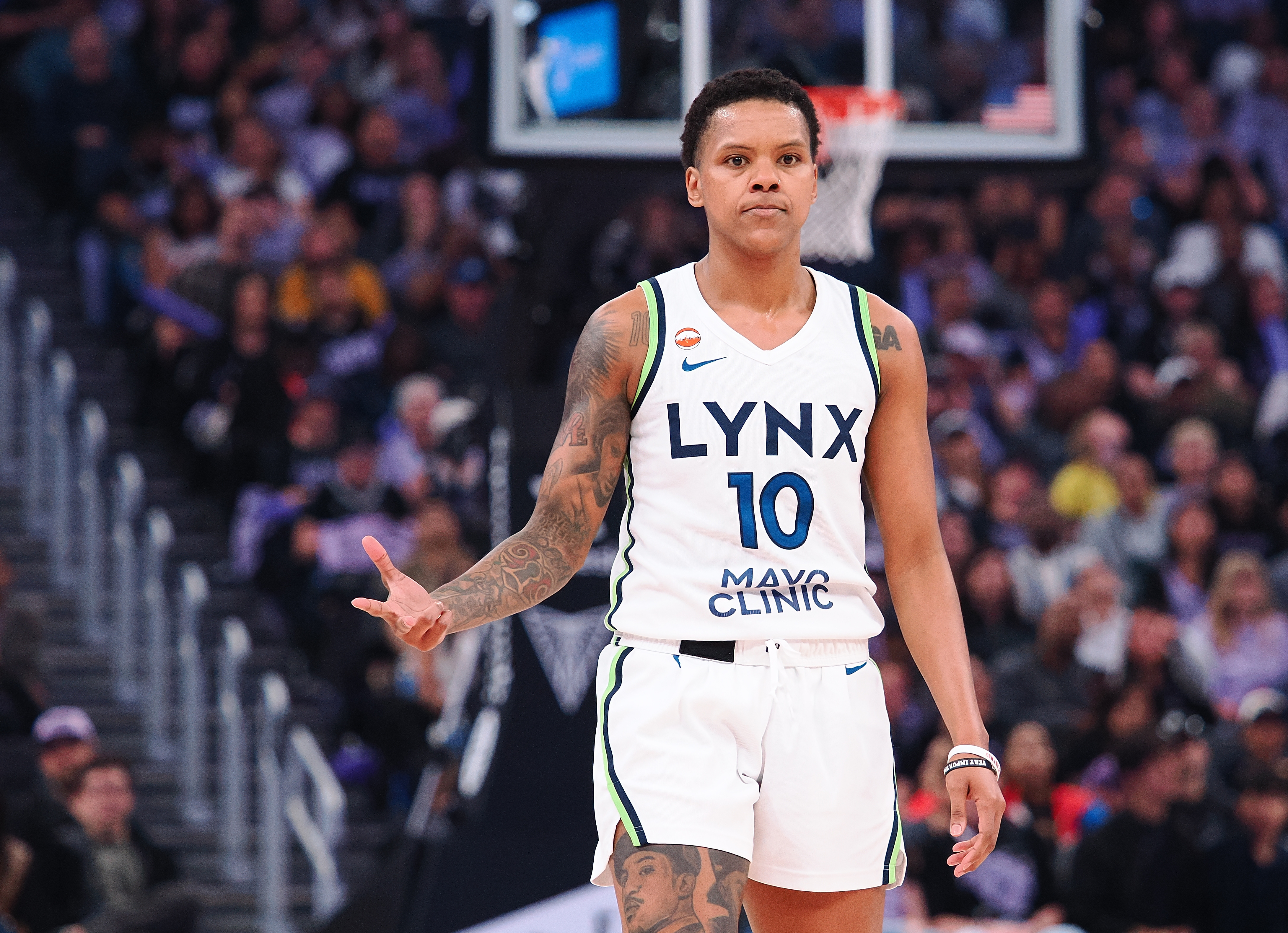 Minnesota Lynx guard Courtney Williams (10) gestures as we break down our Lynx vs. Sun prediction.