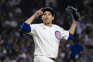 Pitcher Javier Assad of the Chicago Cubs points skyward as we look at our Cubs vs. Cardinals Player Prop Predictions