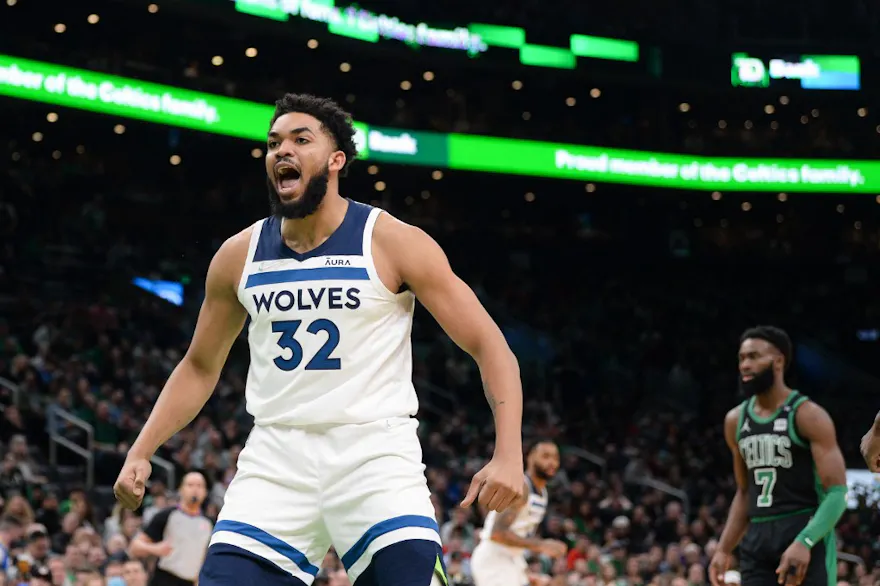 Karl-Anthony Towns of the Minnesota Timberwolves reacts after dunking as we look at our top Thunder vs. Timberwolves predictions