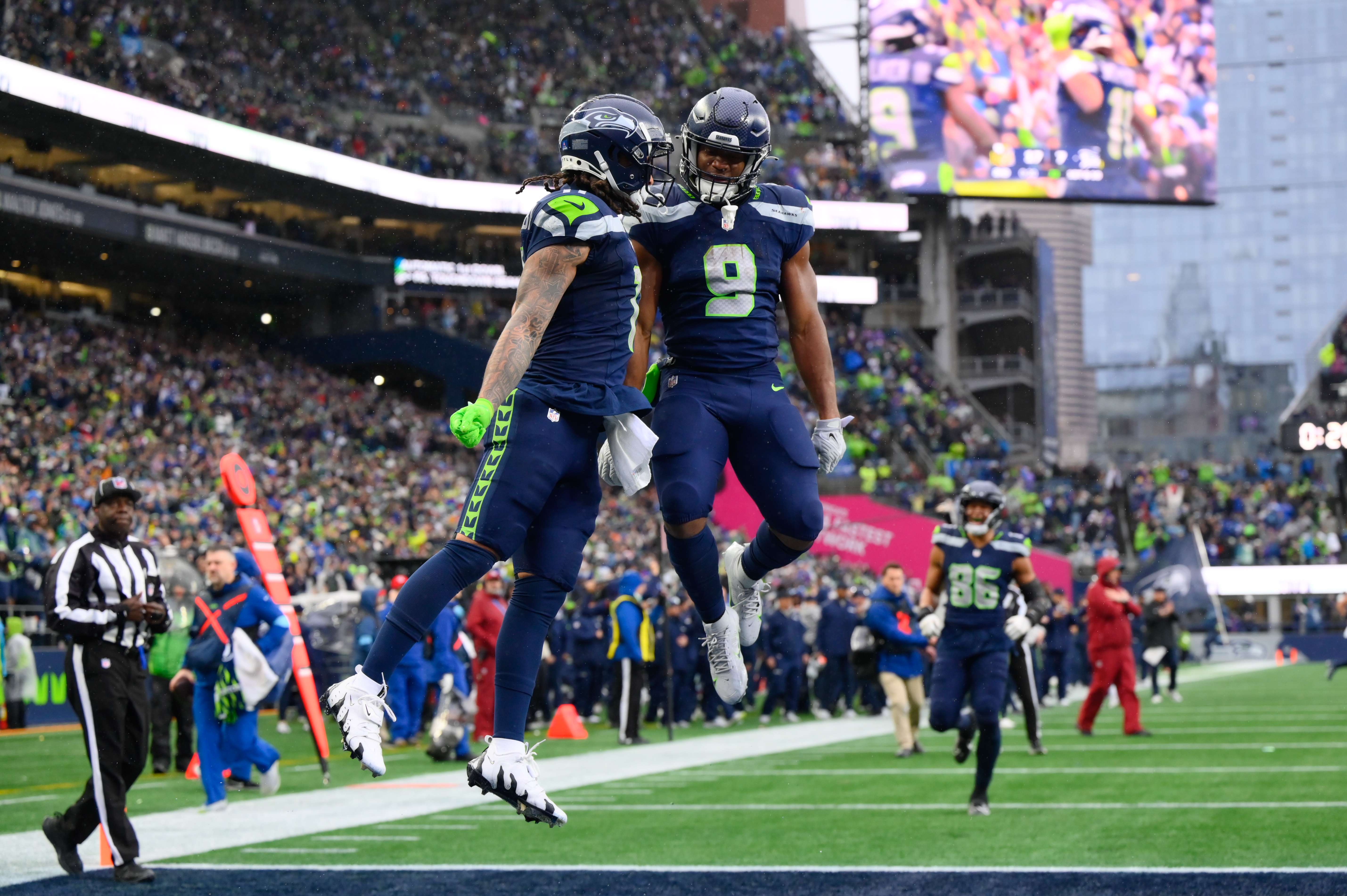 Jaxon Smith-Njigba and Kenneth Walker III celebrate after a touchdown as we provide our 5 Super Bowl long shot bets to make now.