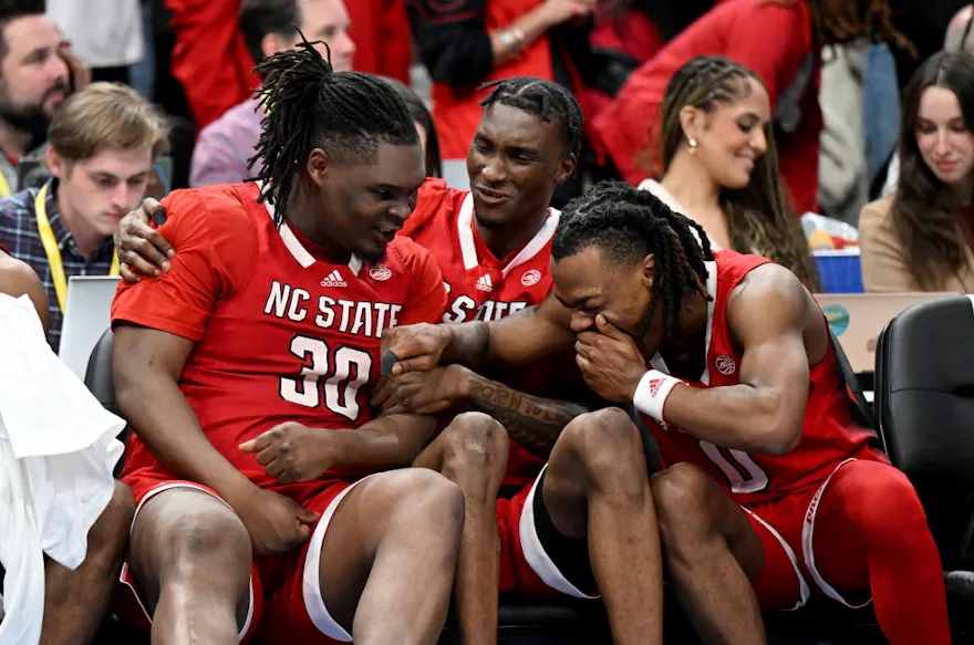 NC State Wolfpack players react on the bench as we look at our DraftKings North Carolina promo code