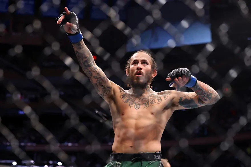 Marlon Vera celebrates after his TKO victory as we look at the best Caesars promo code for UFC 299.