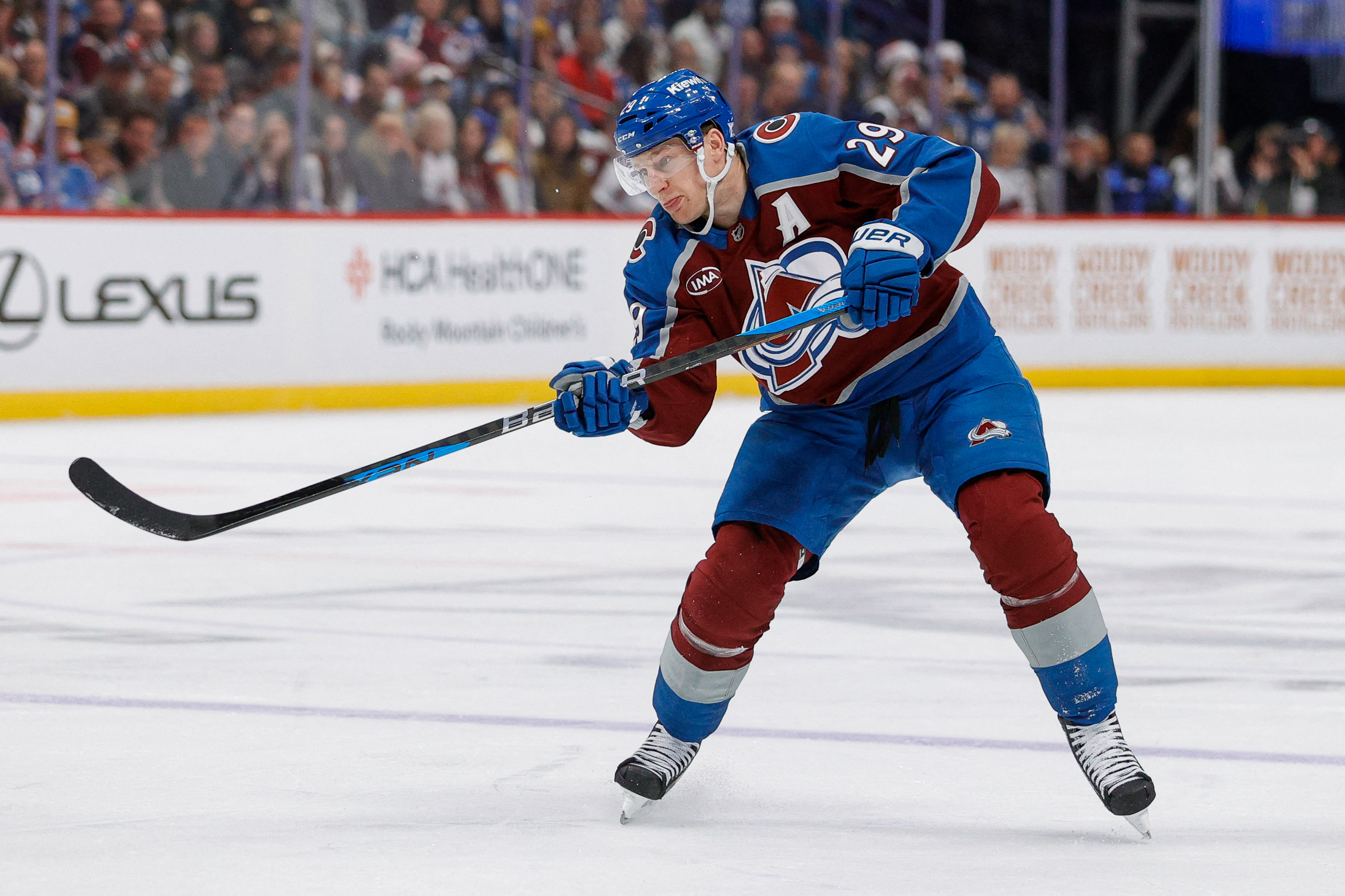olorado Avalanche center Nathan MacKinnon (29) shoots the puck as we offer our Capitals vs. Avalanche prediction today.