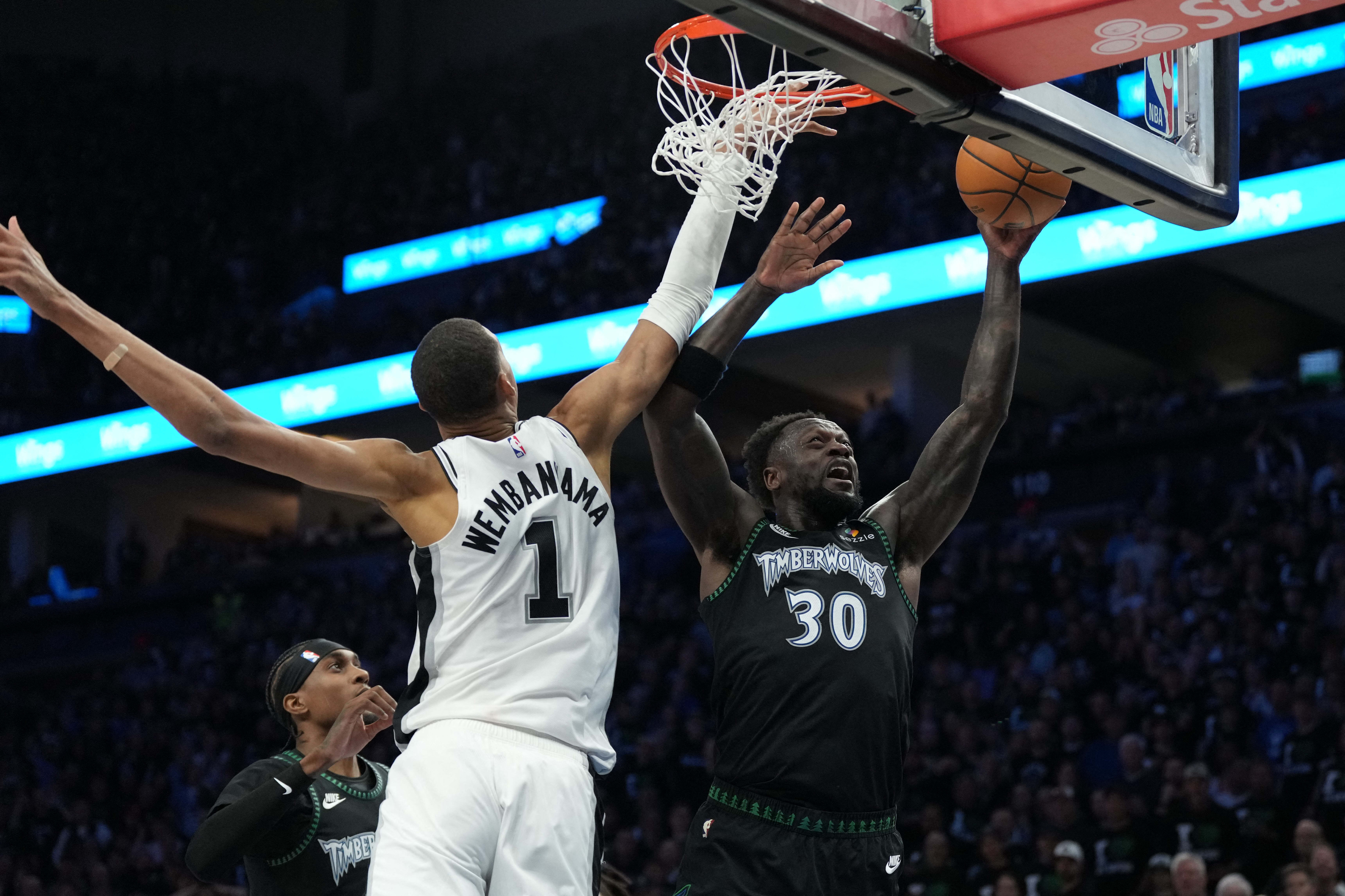 Minnesota Timberwolves forward Julius Randle (30) shoots against San Antonio Spurs center Victor Wembanyama (1) as we provide our Spurs vs. Timberwolves player props today for Game 4.
