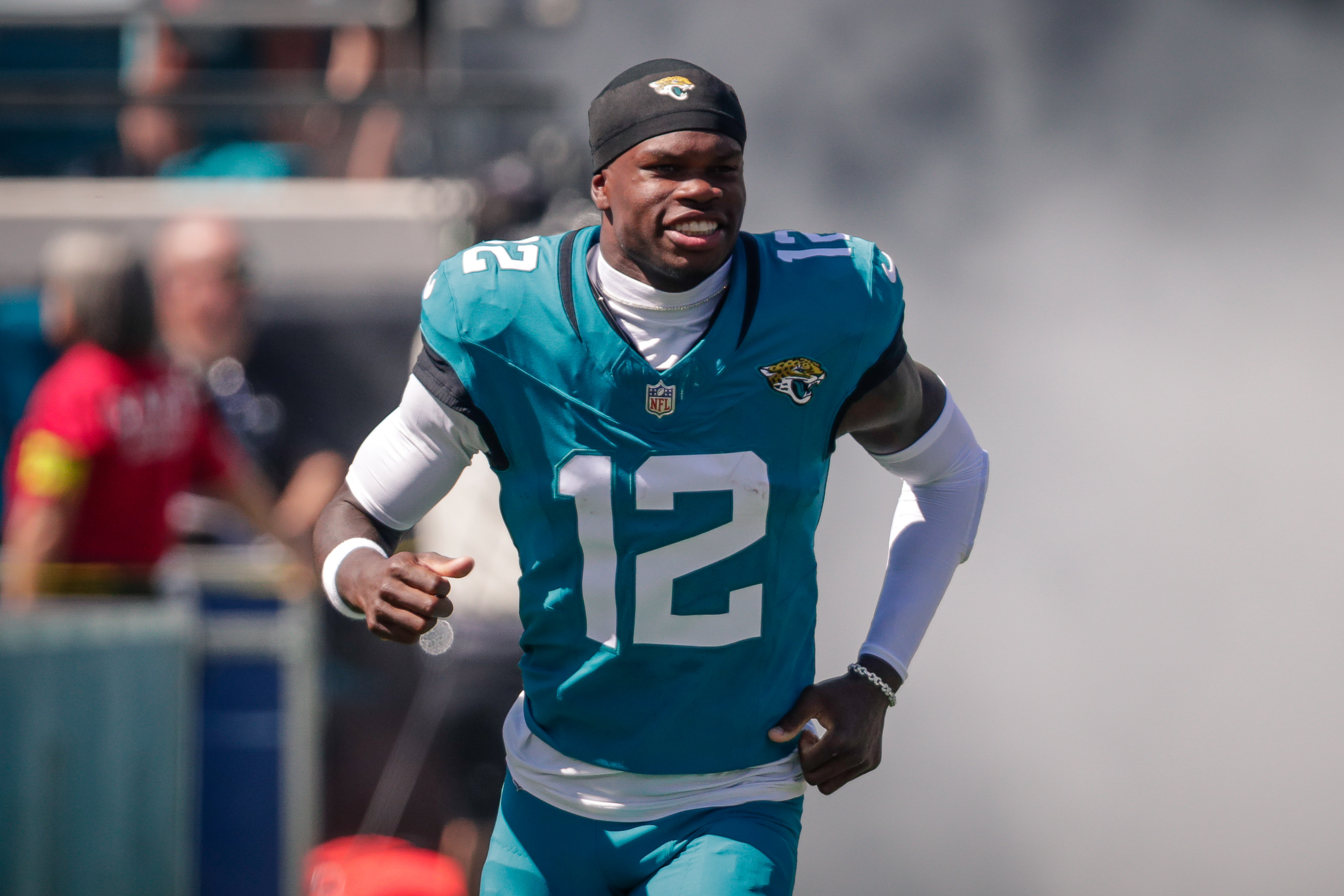 Jacksonville Jaguars player Travis Hunter runs out as we make our best ATS predictions for Week 1 of the NFL season.