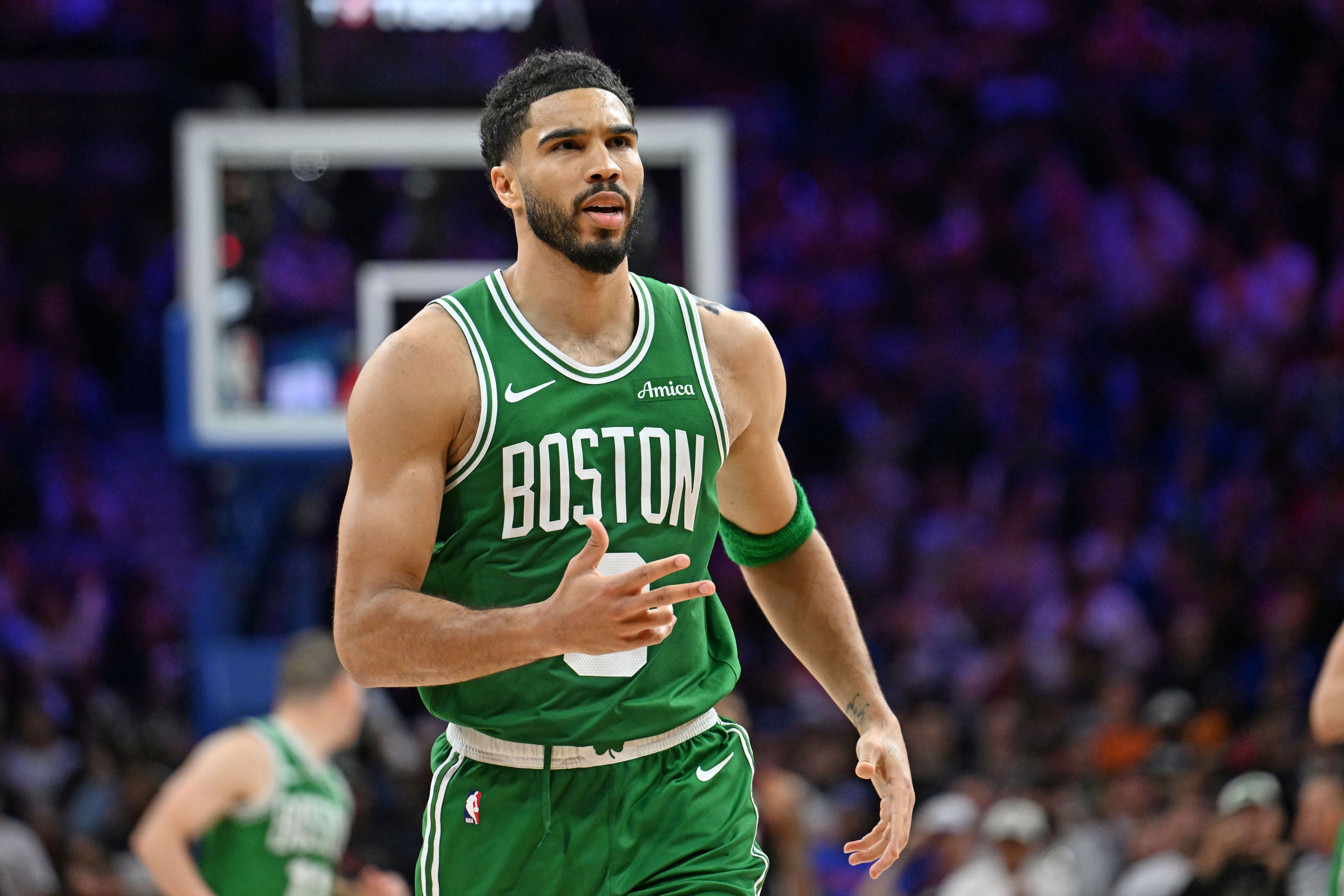 Boston Celtics forward Jayson Tatum reacts after a 3-point basket, and he's key as we look at our Celtics vs. 76ers player props.