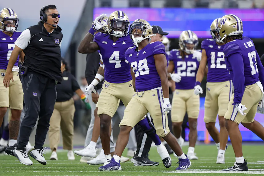 Washington Huskies linebacker Khmori House celebrates as we look at our college football upset picks for Week 5