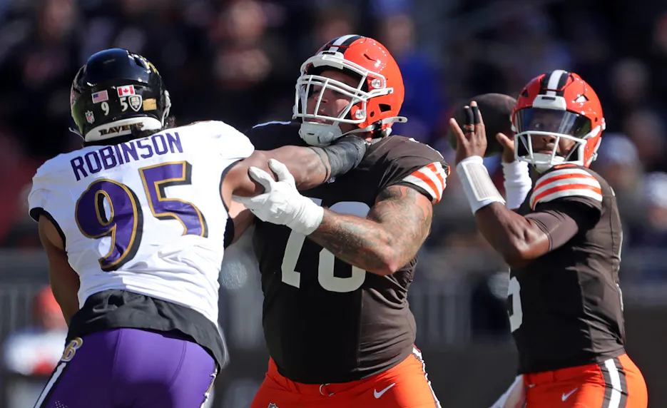 Jameis Winston prepares to throw a pass against the Baltimore Ravens as we offer our Browns vs. Broncos MNF prediction.
