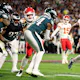 Jerick McKinnon of the Kansas City Chiefs runs the ball against the Philadelphia Eagles as we share our favorite Chiefs vs. Jets player prop picks. 