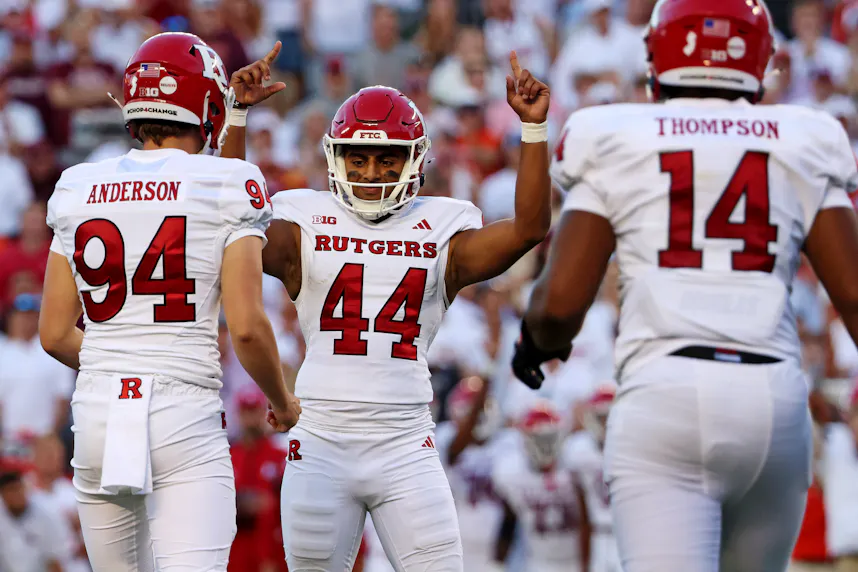 Rutgers Scarlet Knights place kicker Jai Patel celebrates as we look at the state advancing a bill to ban sportsbook and public university partnerships.