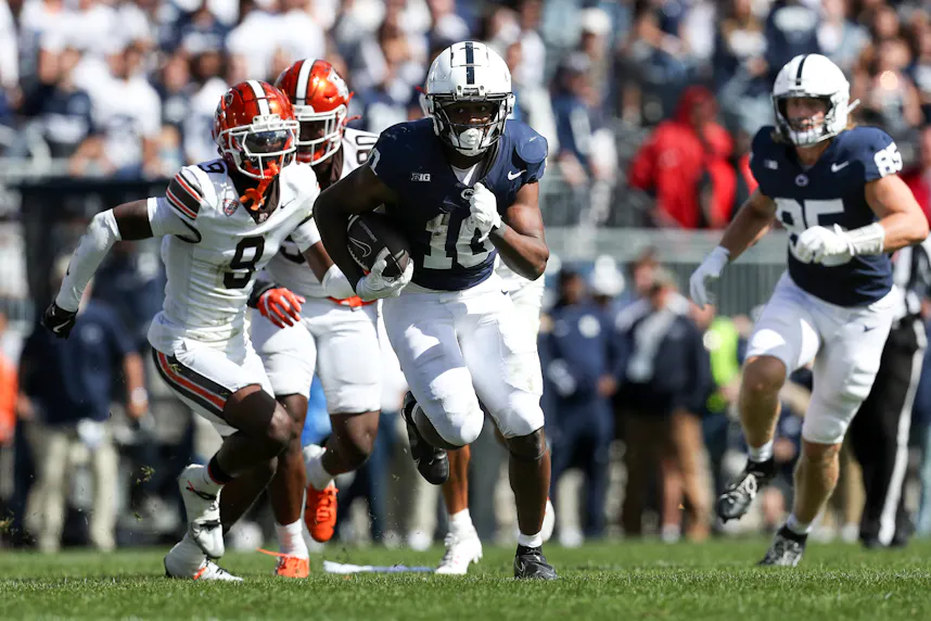 Penn State running back Nicholas Singleton runs the ball against Bowling Green. We're backing the Nittany Lions in our college football Week 5 against the spread picks.