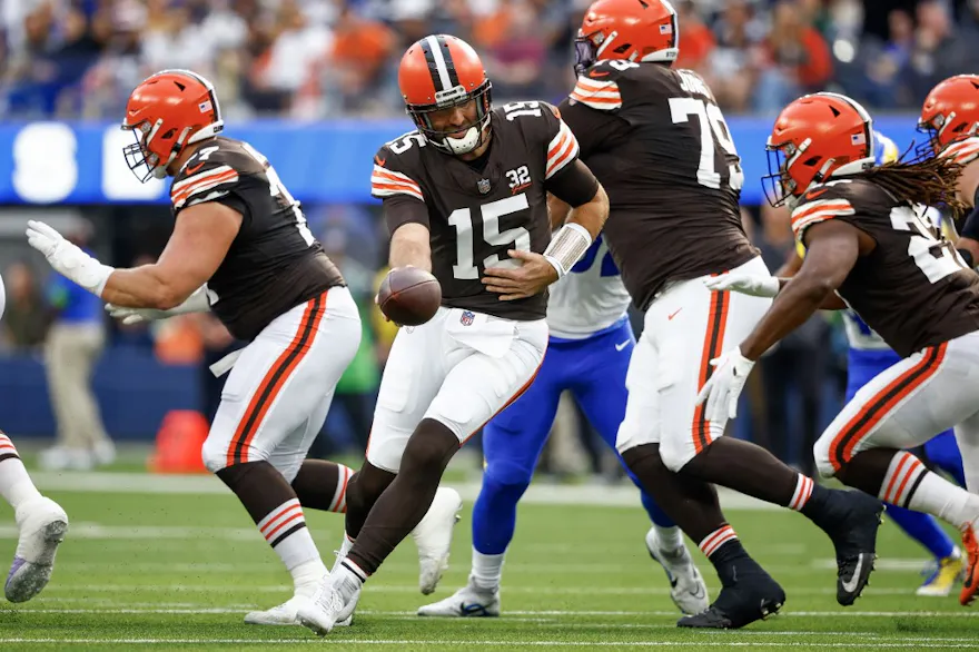 Joe Flacco of the Cleveland Browns hands the ball off to Kareem Hunt in the first quarter against the Los Angeles Rams, and we offer our top Browns vs. Texans player props based on the best NFL odds.