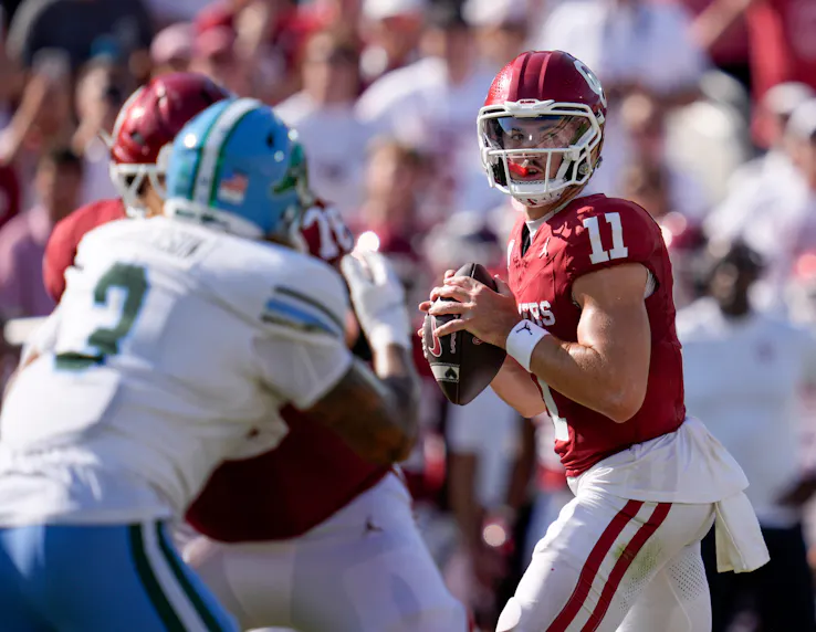Oklahoma Sooners quarterback Jackson Arnold drops back to pass against Tulane Green Wave as we offer our best Tennessee vs. Oklahoma player props.