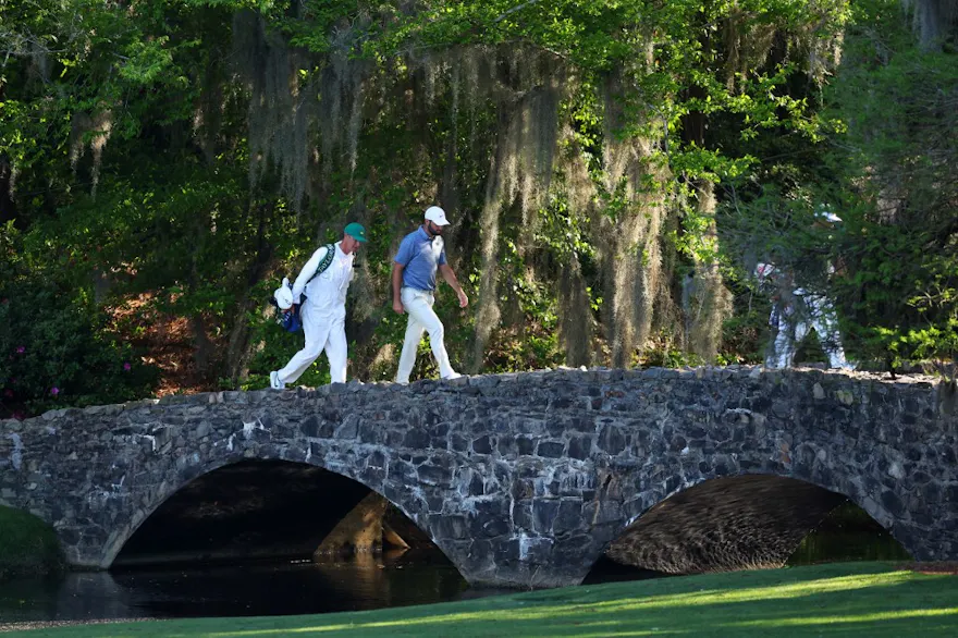 Scottie Scheffler of the United States walks over the bridge on the 13th hole as we look at the best Masters Round 3 odds for our top picks