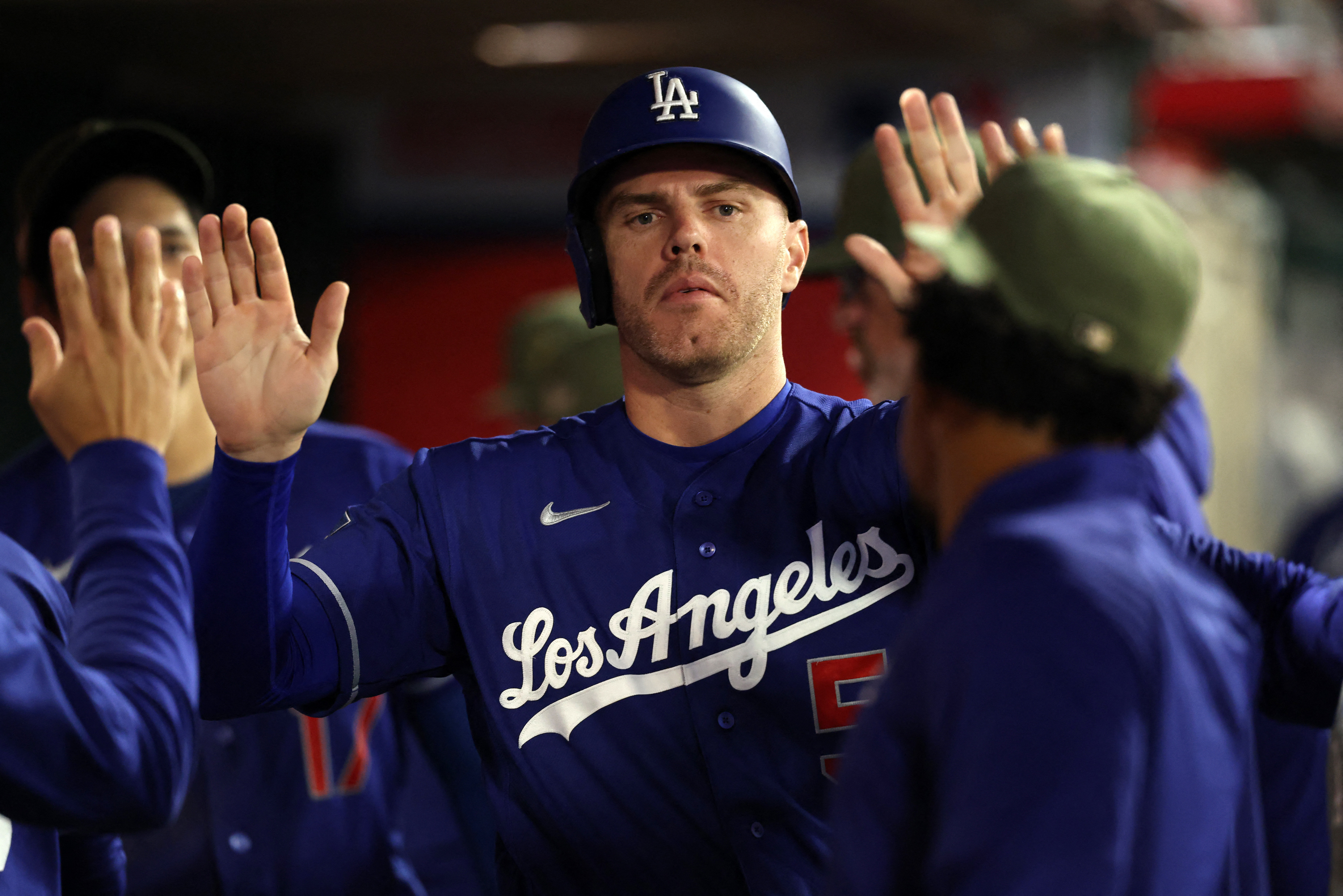 Los Angeles Dodgers first baseman Freddie Freeman (5) rounds the bases. 