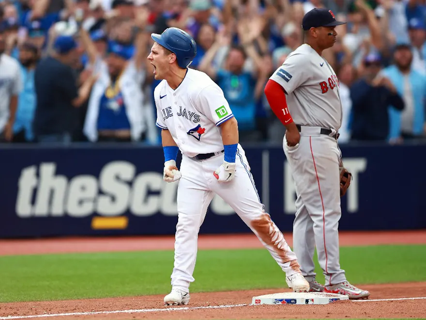 Daulton Varsho of the Toronto Blue Jays reacts after hitting a triple in the ninth inning against the Boston Red Sox, and we offer our top Blue Jays vs. Rays player props based on the best MLB odds.