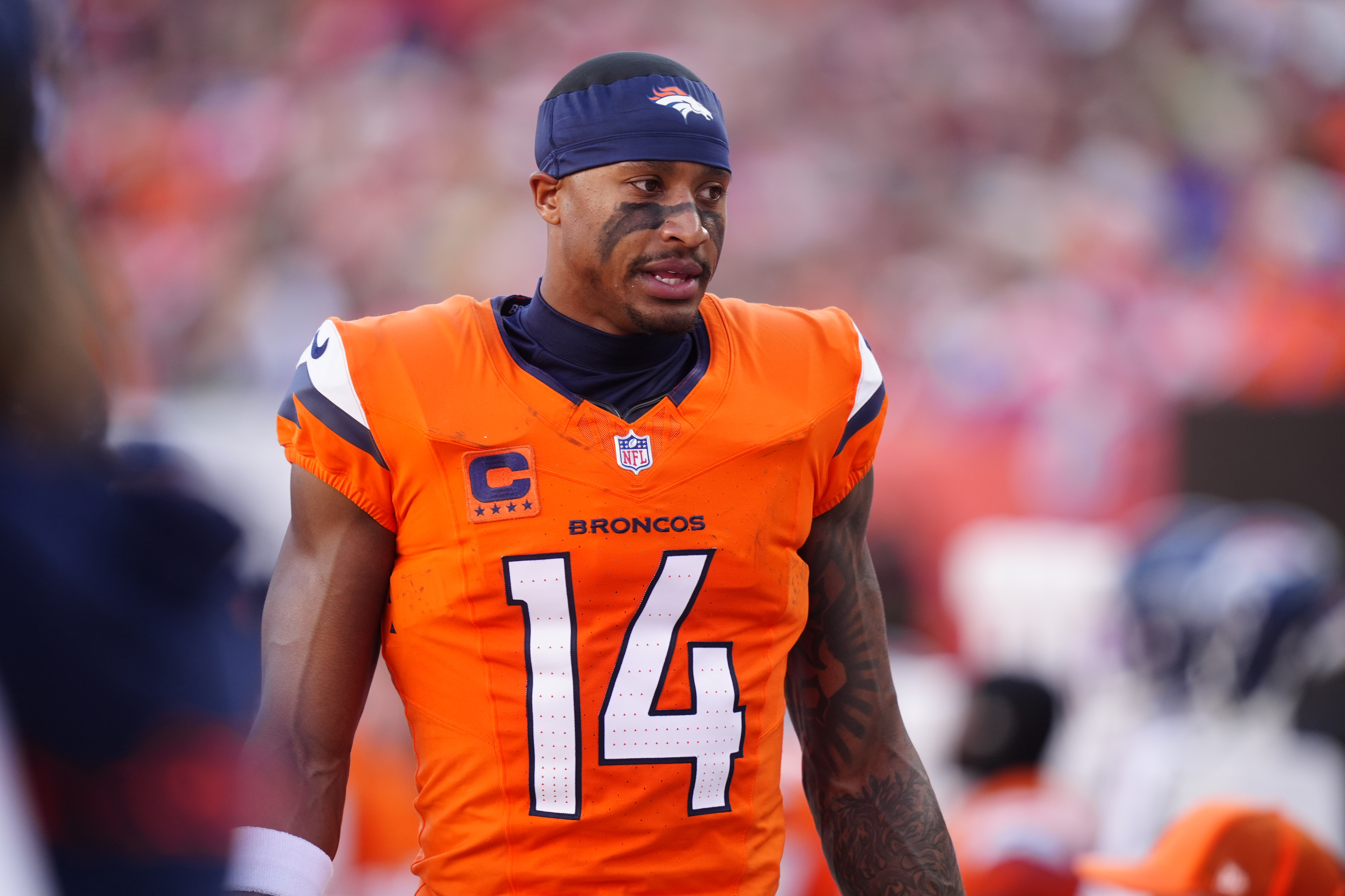 Denver Broncos wide receiver Courtland Sutton (14), seen here standing on the sidelines, is featured in our Broncos vs. Chiefs player props for NFL Christmas Day.