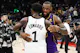 Minnesota Timberwolves guard Anthony Edwards (1) and Los Angeles Lakers forward LeBron James (6) hug as we examine the latest 2024 Olympic Men's Basketball Tournament odds and favorites ahead of the 2024 Olympic Games in Paris, France.