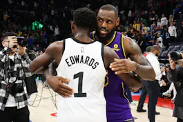 Minnesota Timberwolves guard Anthony Edwards (1) and Los Angeles Lakers forward LeBron James (6) hug as we examine the latest 2024 Olympic Men's Basketball Tournament odds and favorites ahead of the 2024 Olympic Games in Paris, France.