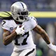 Davante Adams #17 of the Las Vegas Raiders carries the ball against the Seattle Seahawks during the fourth quarter at Lumen Field on Nov. 27.
