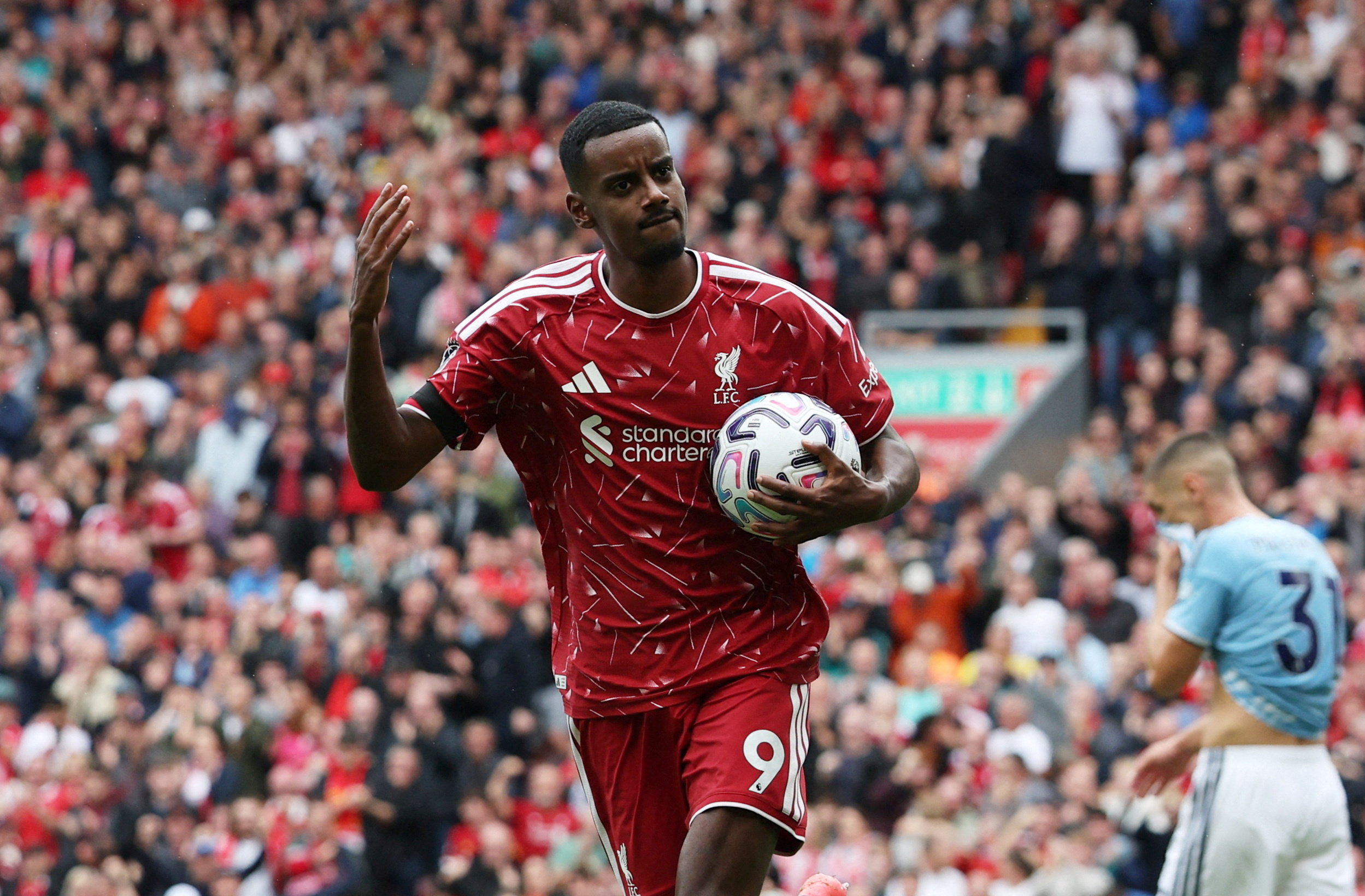 Liverpool's Alexander Isak celebrates scoring as we make our best Ipswich vs. Liverpool prediction.