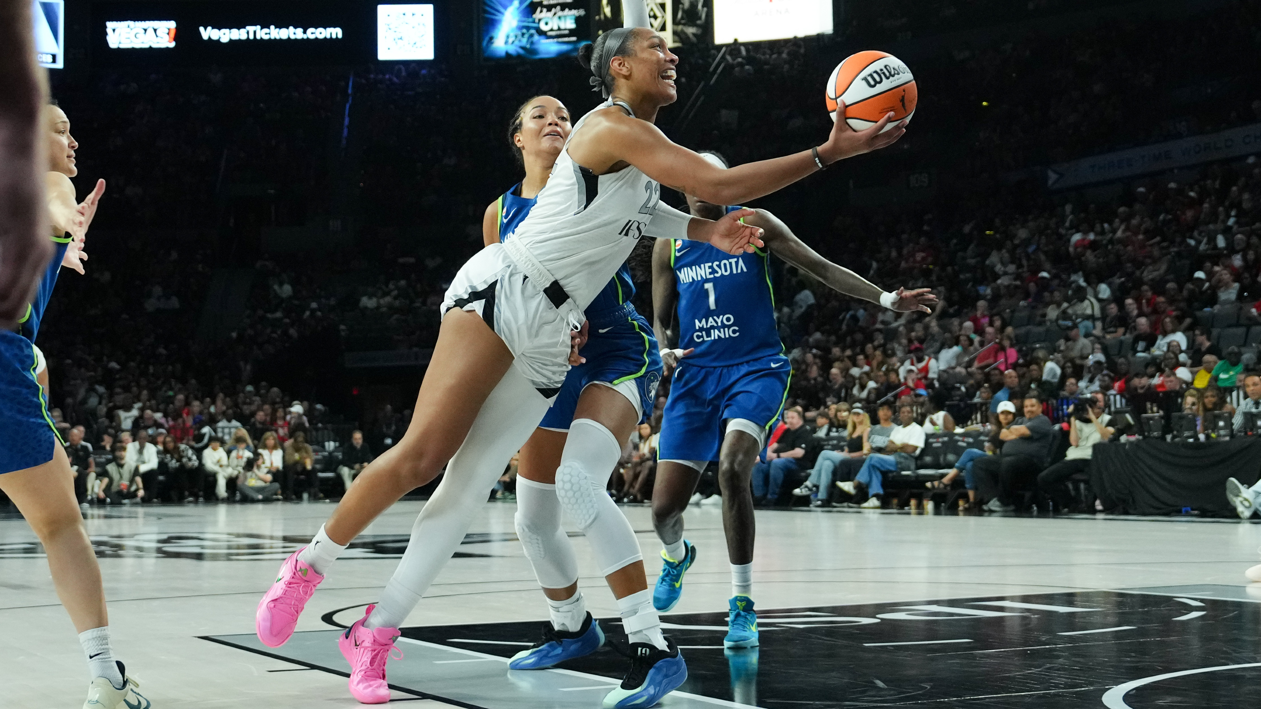  Las Vegas Aces center A'ja Wilson collides with Minnesota Lynx forward Napheesa Collier as we make our best Dream vs. Aces prediction. 