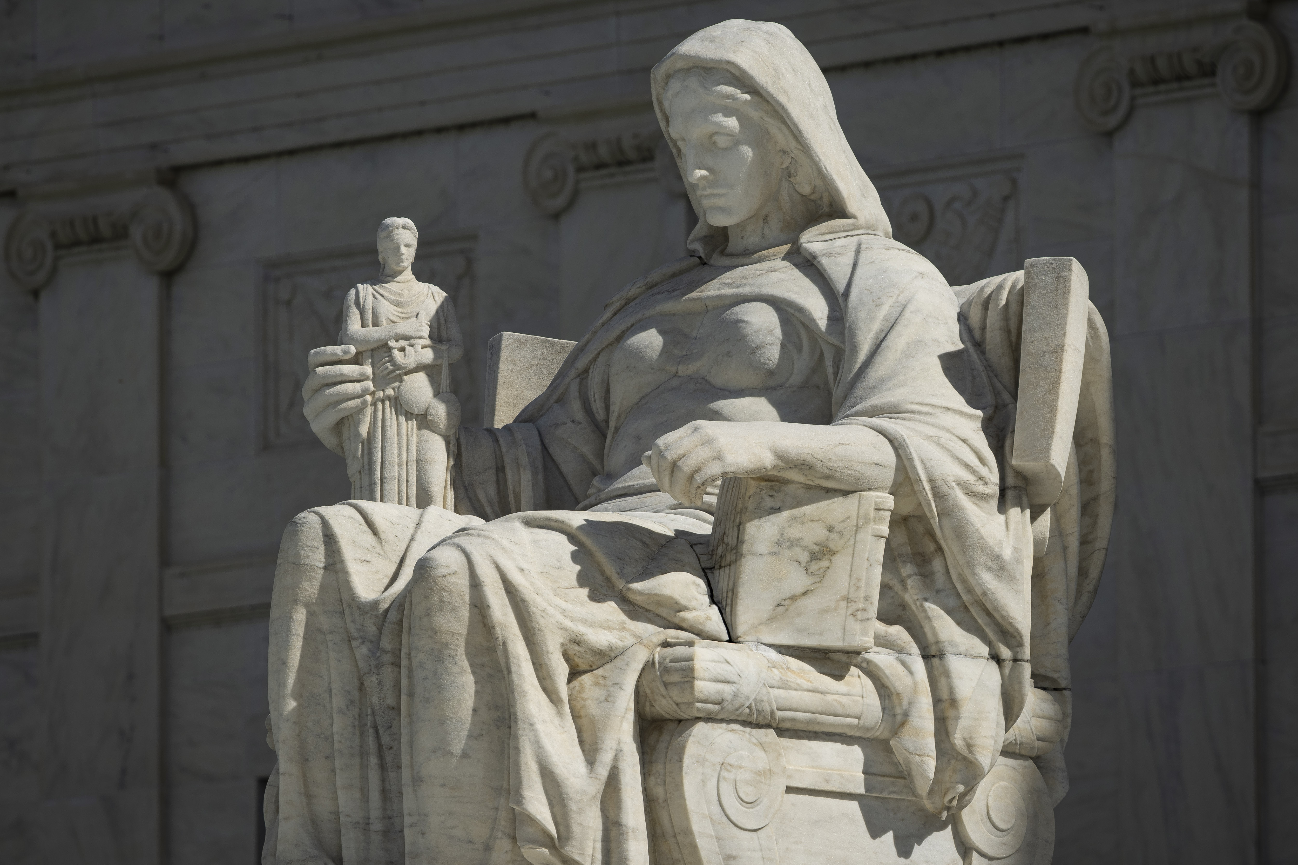 The Contemplation of Justice statue at the U.S. Supreme Court, as state AGs join the push to take up New Jersey v. Kalshi.