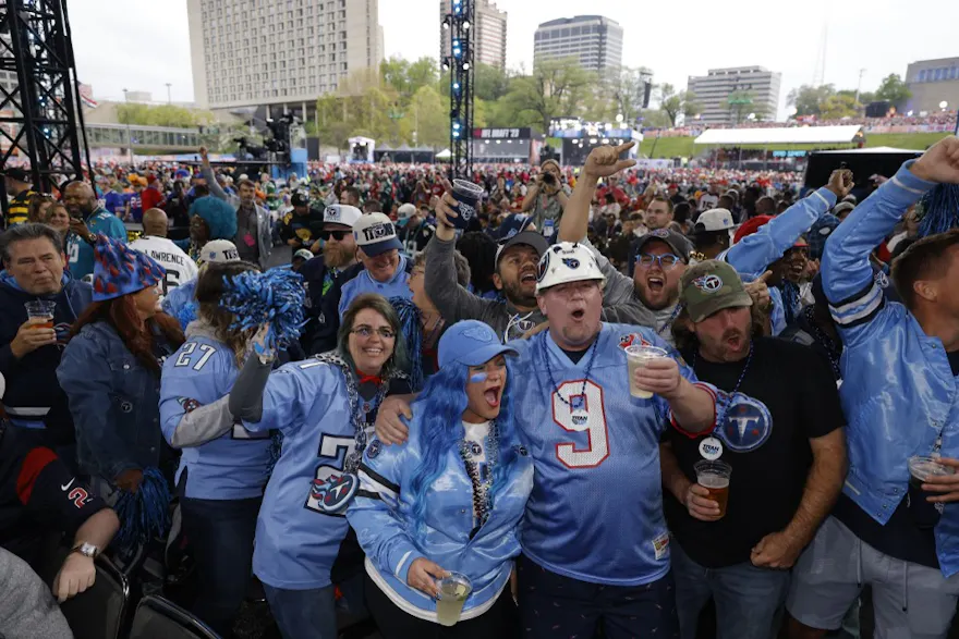 Tennessee Titans fans react to their teams selection in the second round of the 2023 NFL Draft at Union Station in Kansas City, Missouri. Photo by David Eulitt/Getty Images via AFP.