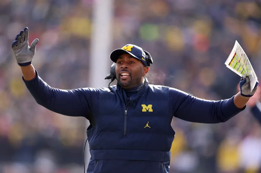Interim head coach Sherrone Moore of the Michigan Wolverines celebrates a touchdown as we look at Michigan's next head coach odds